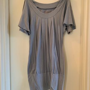 Long light gray shirt